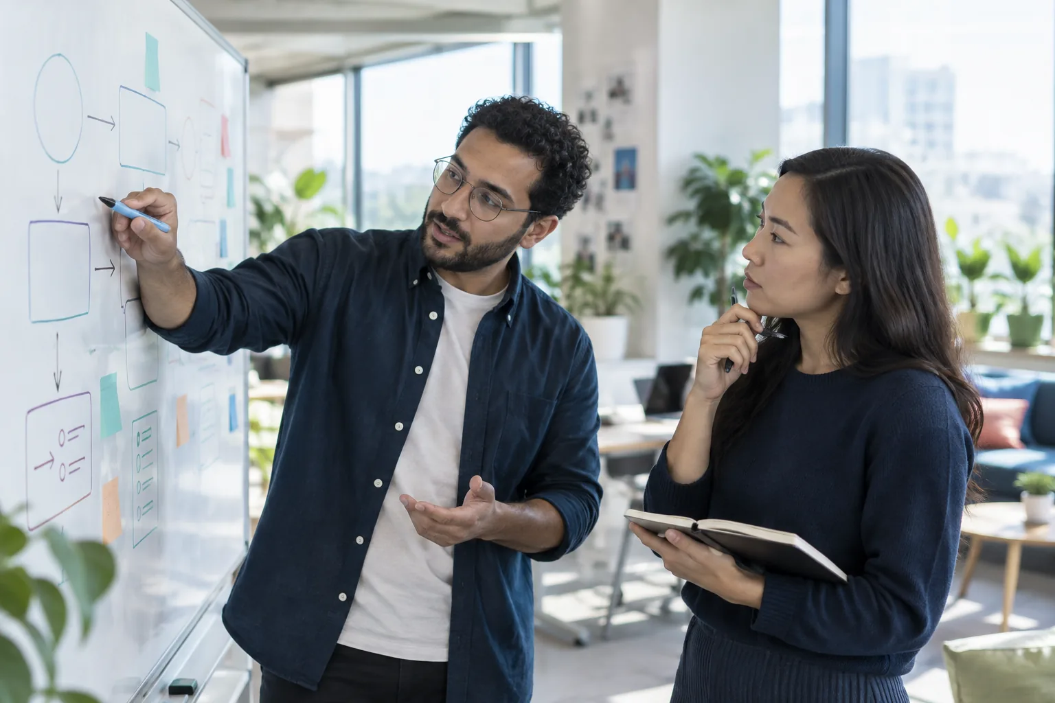 Illustrative scene of people discussing ideas at a whiteboard